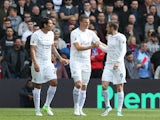 Robert Huth celebrates with Leonardo Ulloa and Jamie Vardy after scoring during the Premier League game between Crystal Palace and Leicester City on April 15, 2017