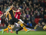 Harry Maguire and Paul Pogba during the Premier League match between Hull City and Manchester United on February 1, 2017