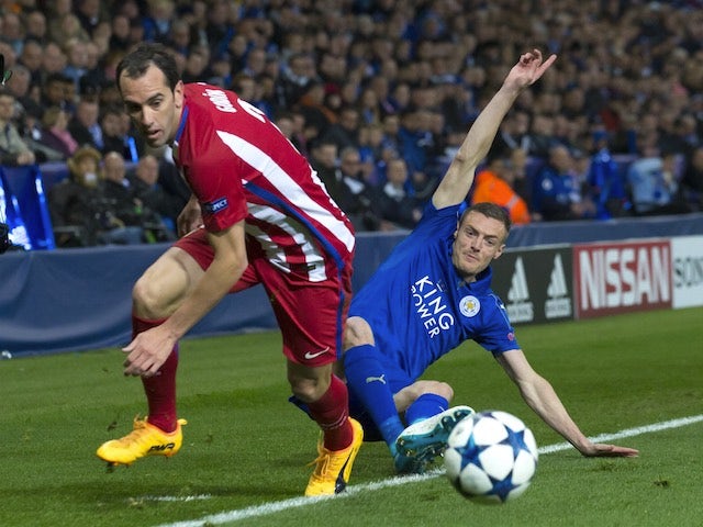 Jamie Vardy tussles with Diego Godin during the Champions League quarter-final second leg between Leicester City and Atletico Madrid on April 18, 2017