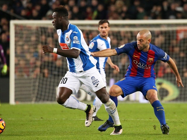 Javier Mascherano and Felipe Caicedo during the match between Barcelona and Espanyol on December 18, 2016