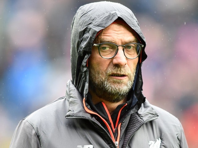 A hooded Jurgen Klopp looking shifty during the Premier League game between West Bromwich Albion and Liverpool on April 16, 2017
