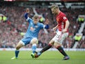 Luke Shaw and Ryan Fraser in the match between Manchester United and Bournemouth on March 4, 2017