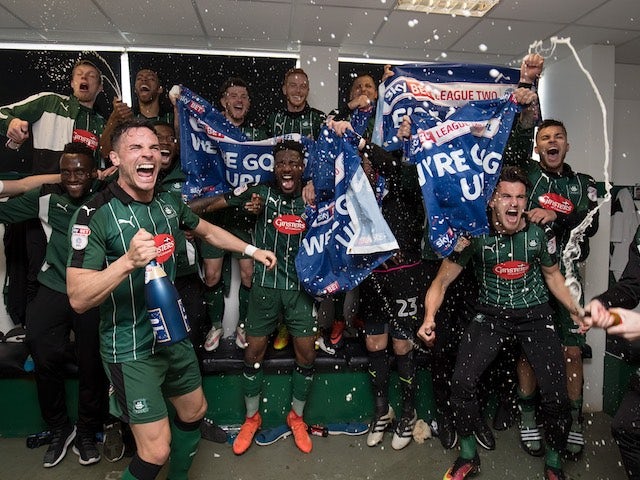 Plymouth Argyle players celebrate promotion to League One on April 17, 2017
