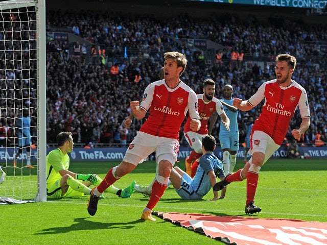 Arsenal's Nacho Monreal celebrates scoring his side's first goal during the FA Cup semi-final against Manchester City on April 23, 2017