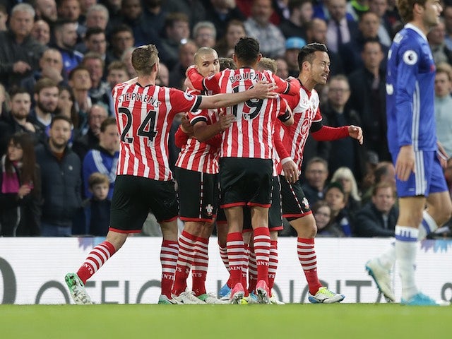 Oriol Romeu celebrates with teammates after equalising during the Premier League game between Chelsea and Southampton on April 25, 2017