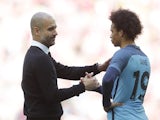 Manchester City's Pep Guardiola and Leroy Sane after their FA Cup semi-final defeat to Arsenal on April 23, 2017