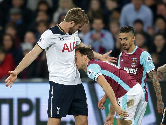 West Ham United's Mark Noble noses Tottenham Hotspur's Eric Dier during the Premier League match on May 5, 2017