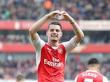 Arsenal midfielder Granit Xhaka celebrates after opening the scoring during his side's Premier League clash with Manchester United at the Emirates Stadium on May 7, 2017