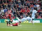 Harry Arter takes out Joe Allen during the Premier League game between Bournemouth and Stoke City on May 6, 2017