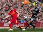 James Milner and Dusan Tadic in action during the Premier League game between Liverpool and Southampton on May 7, 2017