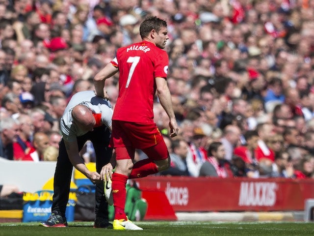 James Milner has his studs tweaked during the Premier League game between Liverpool and Southampton on May 7, 2017