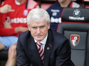 Mark Hughes watches on during the Premier League game between Bournemouth and Stoke City on May 6, 2017