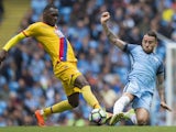 Nicolas Otamendi and Christian Benteke fight for the ball during the Premier League game between Manchester City and Crystal Palace on May 6, 2017