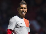 Roberto Firmino flashes a smile ahead of the Premier League game between Liverpool and Southampton on May 7, 2017