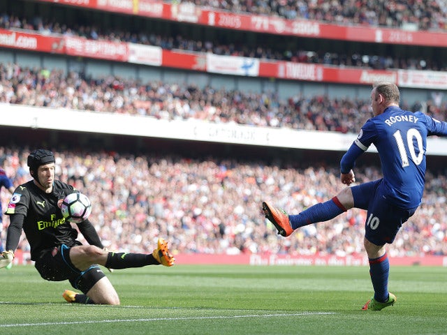 Manchester United forward Wayne Rooney is thwarted by Petr Cech during his side's Premier League clash with Arsenal at the Emirates Stadium on May 7, 2017