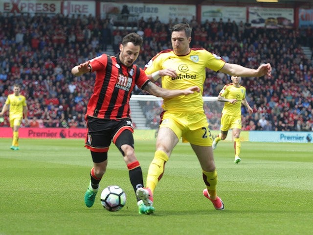 Adam Smith and Stephen Ward in action during the Premier League game between Bournemouth and Burnley on May 13, 2017