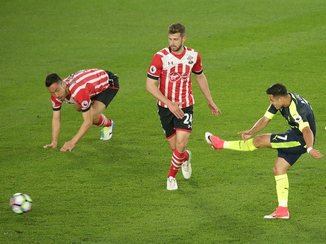 Arsenal's Alexis Sanchez scores the first goal in the Premier League match against Southampton on May 10, 2017