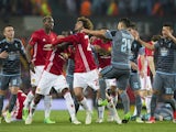 Manchester United's Eric Bailly and Celta Vigo's Facundo Roncaglia come to blows before being sent off in the Europa League semi-final on May 11, 2017