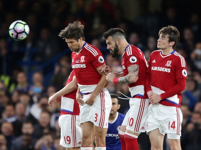 George Friend, Alvaro Negredo and Marten de Roon in action during the Premier League game between Chelsea and Middlesbrough on May 8, 2017