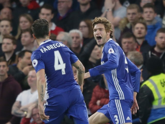 Marcos Alonso celebrates scoring his side's second during the Premier League game between Chelsea and Middlesbrough on May 8, 2017