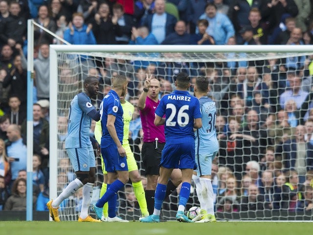 Riyad Mahrez has a penalty disallowed during the Premier League game between Manchester City and Leicester City on May 13, 2017