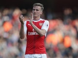 Rob Holding applauds during the Premier League game between Arsenal and Manchester United on May 7, 2017