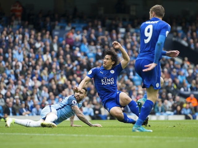 Shinji Okazaki scores during the Premier League game between Manchester City and Leicester City on May 13, 2017
