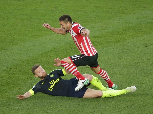 Arsenal's Shkodran Mustafi and Southampton's Dusan Tadic during the Premier League match on May 10, 2017