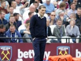 Slaven Bilic watches on during the Premier League game between West Ham United and Liverpool on May 14, 2017