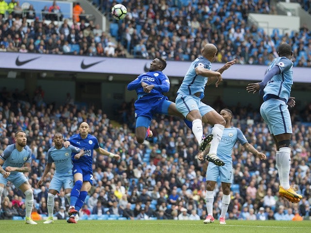 Wilfred Ndidi misses a header during the Premier League game between Manchester City and Leicester City on May 13, 2017