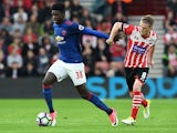 Manchester United's Axel Tuanzebe holds off Southampton's Steven Davis on May 17, 2017