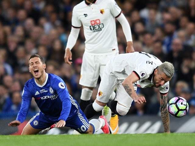 Eden Hazard and Valon Behrami clash during the Premier League match between Chelsea and Watford on May 15, 2017
