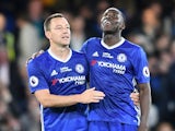 Chelsea's John Terry and Kurt Zouma celebrate after the 4-3 victory over Watford on May 15, 2017