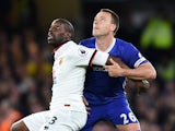 John Terry and Stefano Okaka during the Premier League match between Chelsea and Watford on May 15, 2017