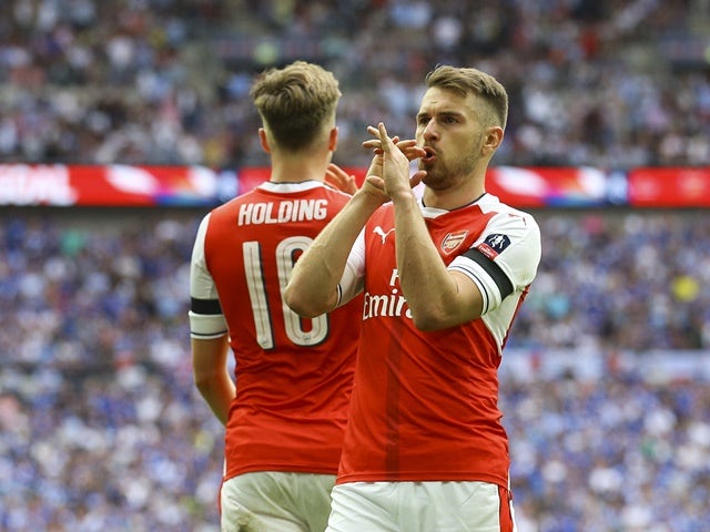 Ramsey happy with Wenger's new deal