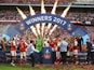 Arsenal celebrate with the trophy after winning the FA Cup final against Chelsea on May 27, 2017