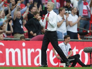 Wenger signs new two-year Arsenal deal