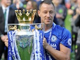 John Terry poses with the trophy during the Premier League game between Chelsea and Sunderland on May 21, 2017
