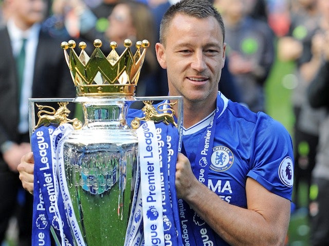 John Terry poses with the trophy during the Premier League game between Chelsea and Sunderland on May 21, 2017