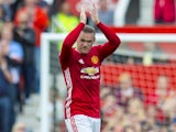 Wayne Rooney applauds after the Premier League game between Manchester United and Crystal Palace on May 21, 2017