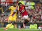 Wilfried Zaha and Demetri Mitchell in action during the Premier League game between Manchester United and Crystal Palace on May 21, 2017