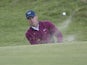 Jordan Spieth chips out of a bunker at The Open on July 21, 2017