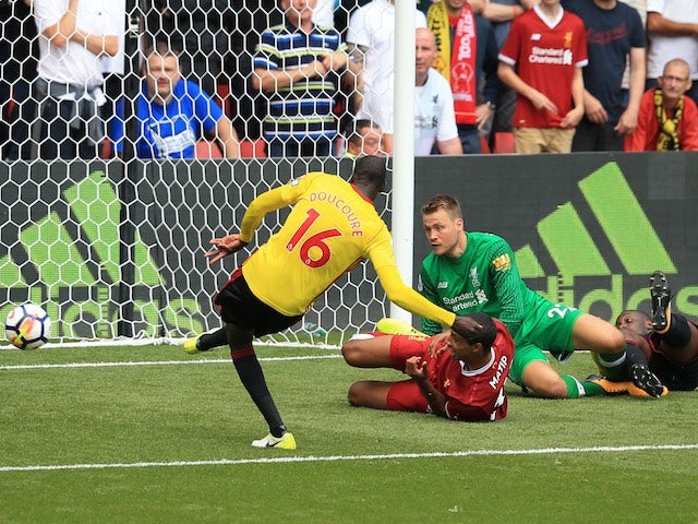 Abdoulaye Doucoure scores his side's second during the Premier League game between Watford and Liverpool on August 12, 2017