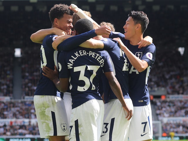 Dele Alli is congratulated by teammates after scoring during the Premier League game between Newcastle United and Tottenham Hotspur on August 13, 2017