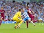 Ederson, Jamie Murphy and Kyle Walker in action during the Premier League game between Brighton & Hove Albion and Manchester City on August 12, 2017