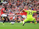 Romelu Lukaku scores the opener during the Premier League game between Manchester United and West Ham United on August 13, 2017