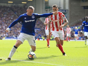 Rooney seals the points on Everton return