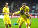 Neymar mounts Edinson Cavani during the Ligue 1 match between Guingamp and Paris Saint-Germain on August 13, 2017