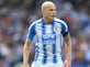Huddersfield Town midfielder Aaron Mooy suffers knee infection