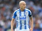 Aaron Mooy in action during the Premier League game between Huddersfield Town and Newcastle United on August 20, 2017